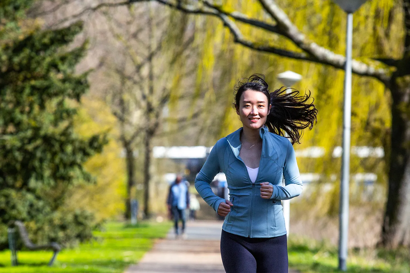 Young woman jogging in a park